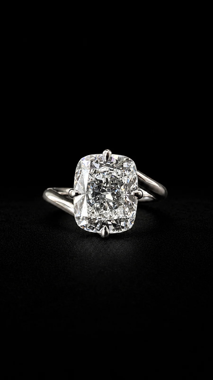 Bypass ring with an elongated centre stone on a black background